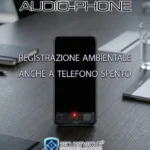 Smartphone AudioPhone su un tavolo che mostra la funzione di registrazione ambientale hardware attiva anche quando il telefono è spento