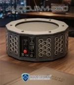 Vista ravvicinata del jammer audio omnidirezionale AUDIOJAM-360 su un tavolo, con dettaglio dei trasduttori a ultrasuoni e del pannello di stato batteria e accensione.